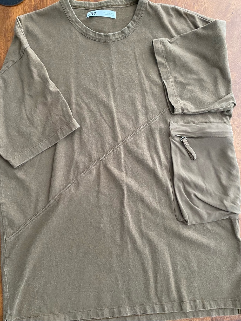 ZARA olive green short sleeve top with front zippered pocket—Women’s size M